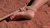 Weird couple Claire Adams and Maestro picked up redhead hitchhiker Amber Rayne and bound her in the desert where whipped and fucked her